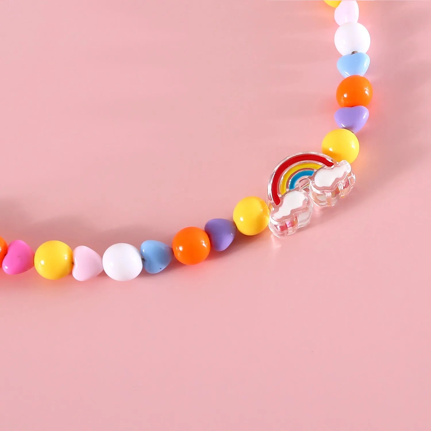 Colourful plastic bead pet necklace with small flower design on a adjustable strap.