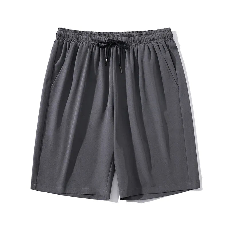 Men's cropped ice silk sports casual pants in black, shown with elastic waist and straight leg cut.
