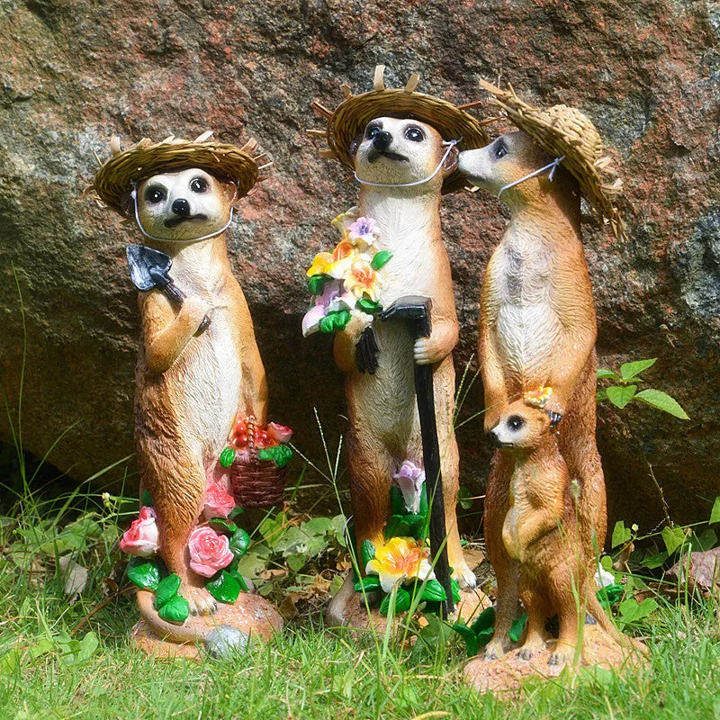 Straw hat mongoose garden ornaments in resin with rake and shovel designs
