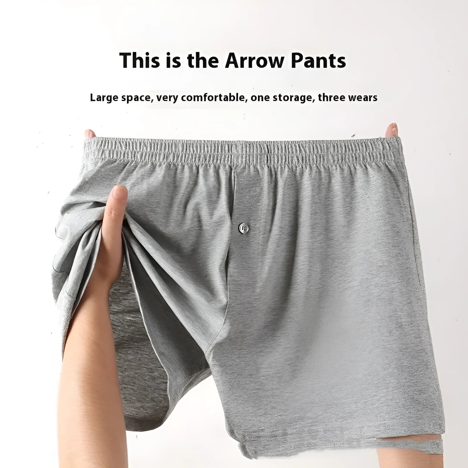 Men's loose-fit pure cotton boxer shorts in light grey, shown laid flat to display high-waist design.
