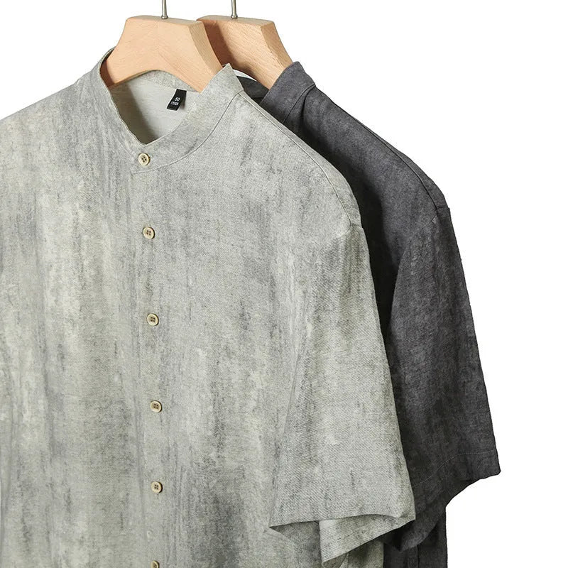 Men's solid colour linen shirt with a stand collar in a loose fit, shown in black grey.
