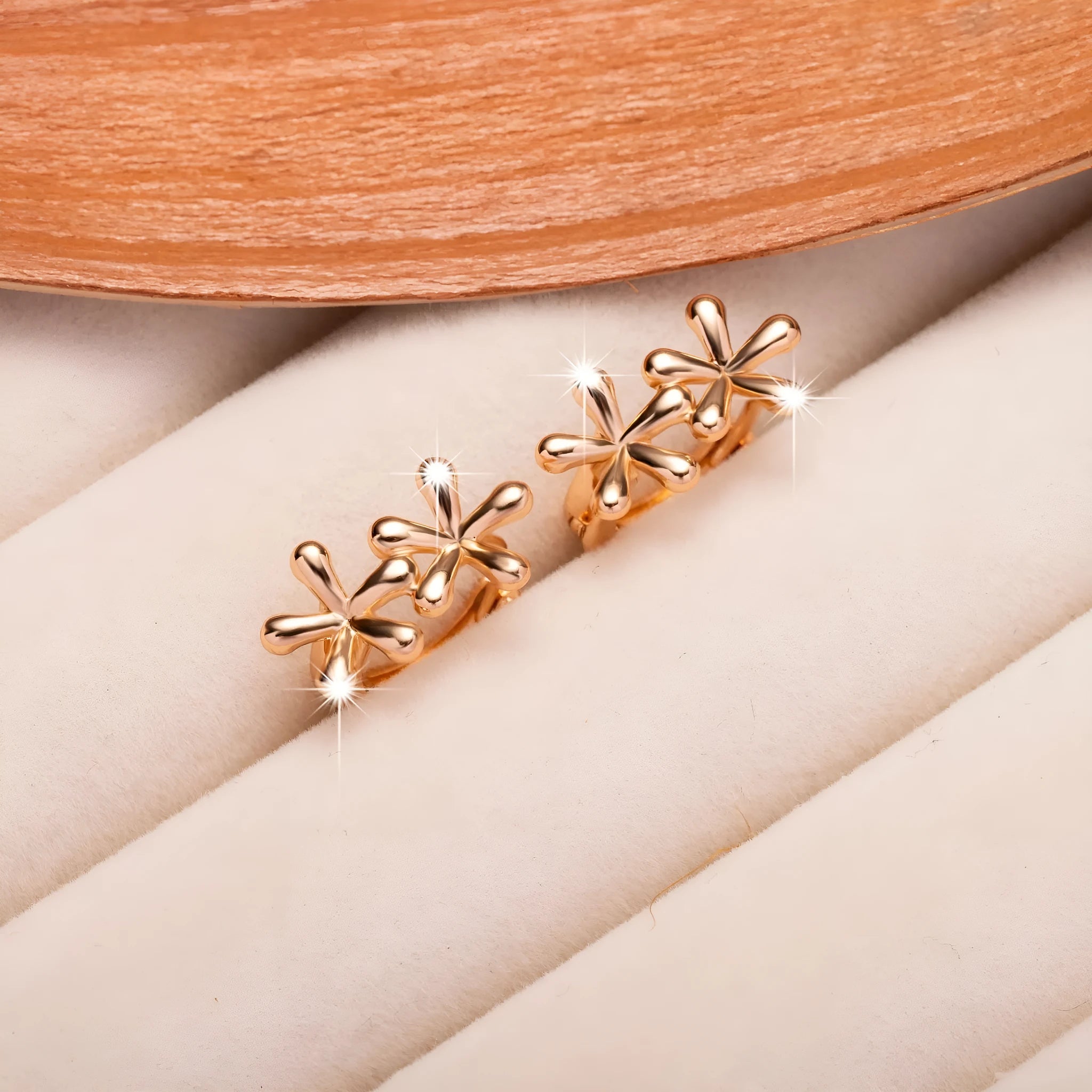 Rose gold electroplated earrings with circular waterdrop flower shape for women