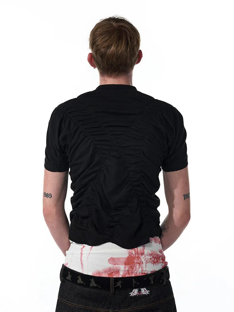 Black men's slim fit short sleeve printed shirt with round neck collar on a mannequin