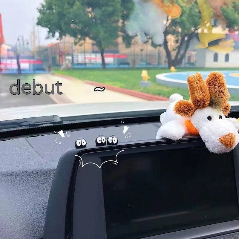 Small black cartoon-shaped resin briquette decorations for car interiors with traceless tape.