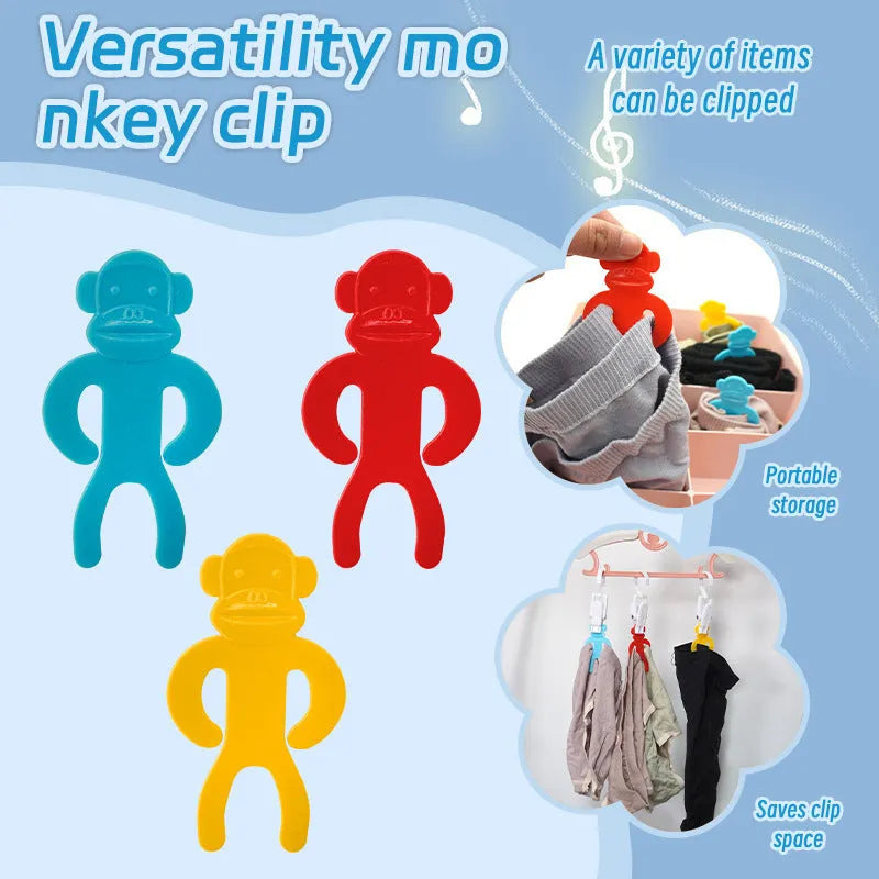 Plastic socks clips in blue, red and yellow colours for laundry organisation
