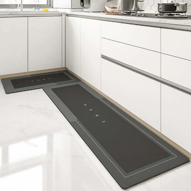 Blue oval blended fabric bathroom floor mat placed on tiled floor.