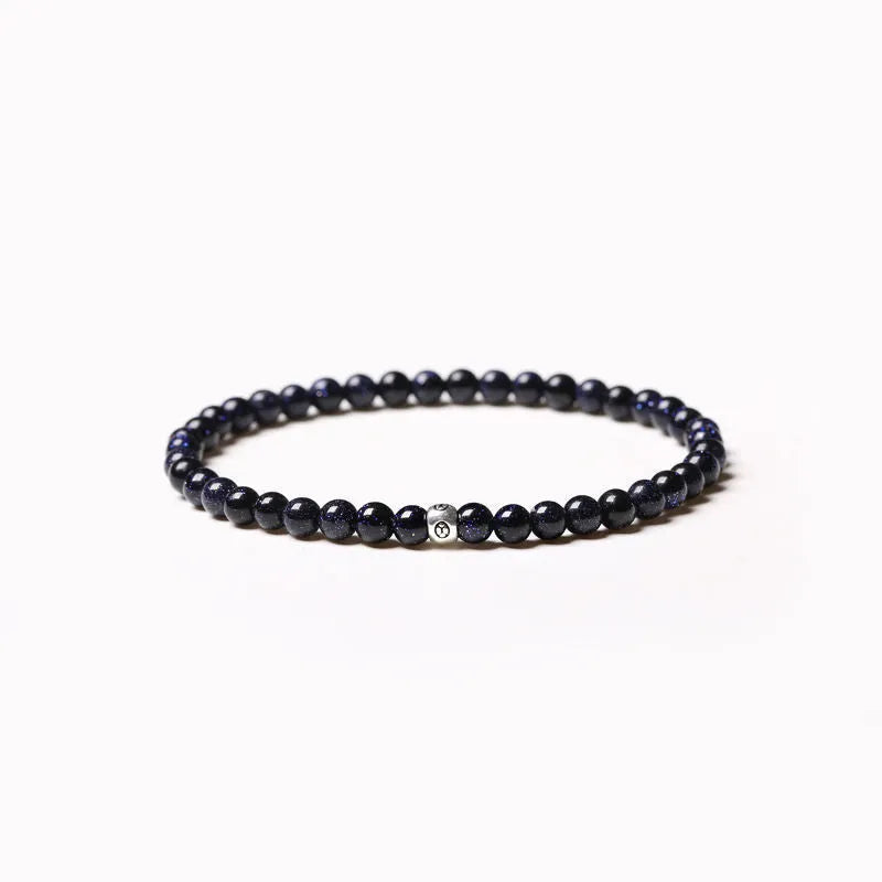 Geometric cut surface black agate bracelet with 4mm obsidian, blue san, and black agate beads