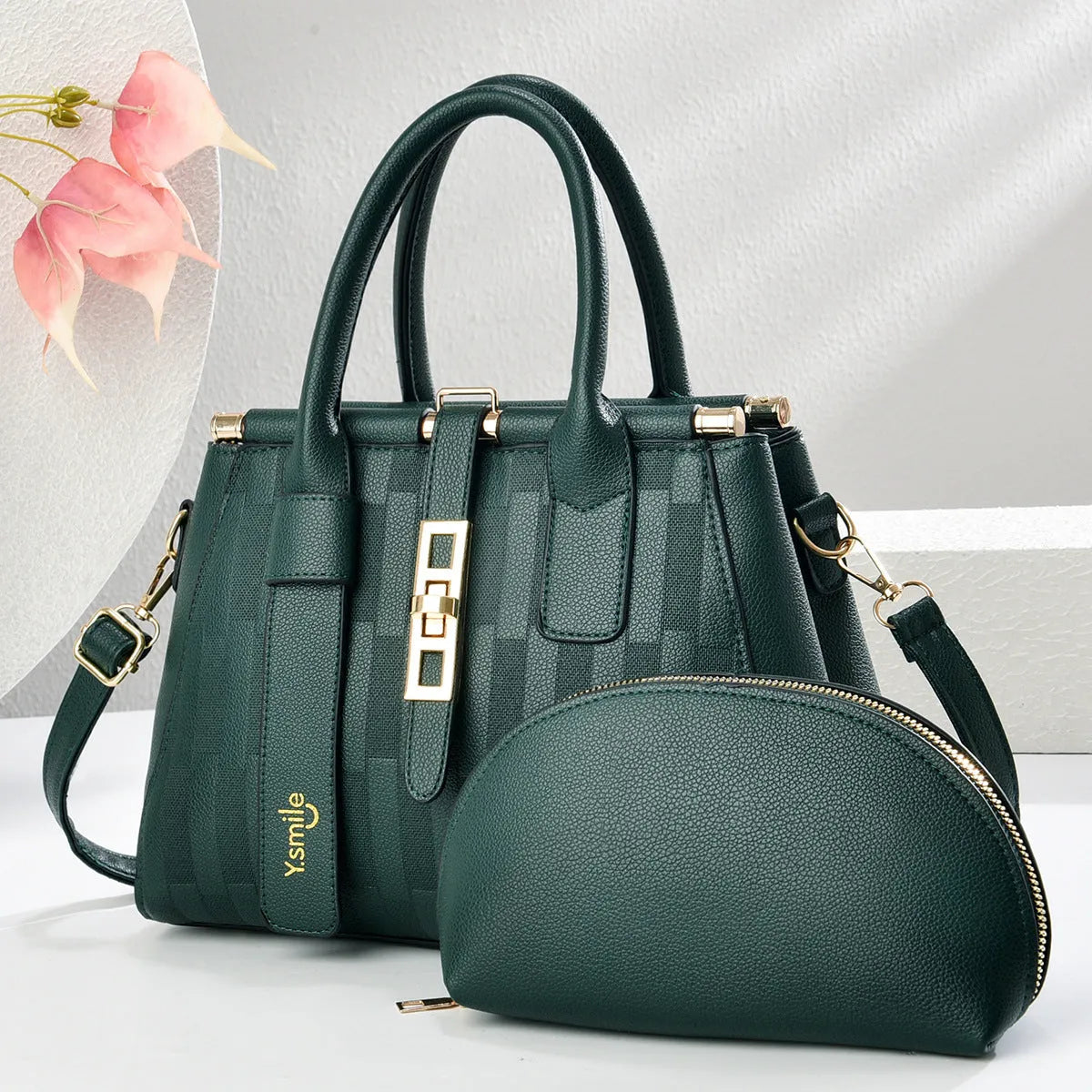 Round suitcase-shaped women's handbag in PU material with crossbody and shoulder strap options