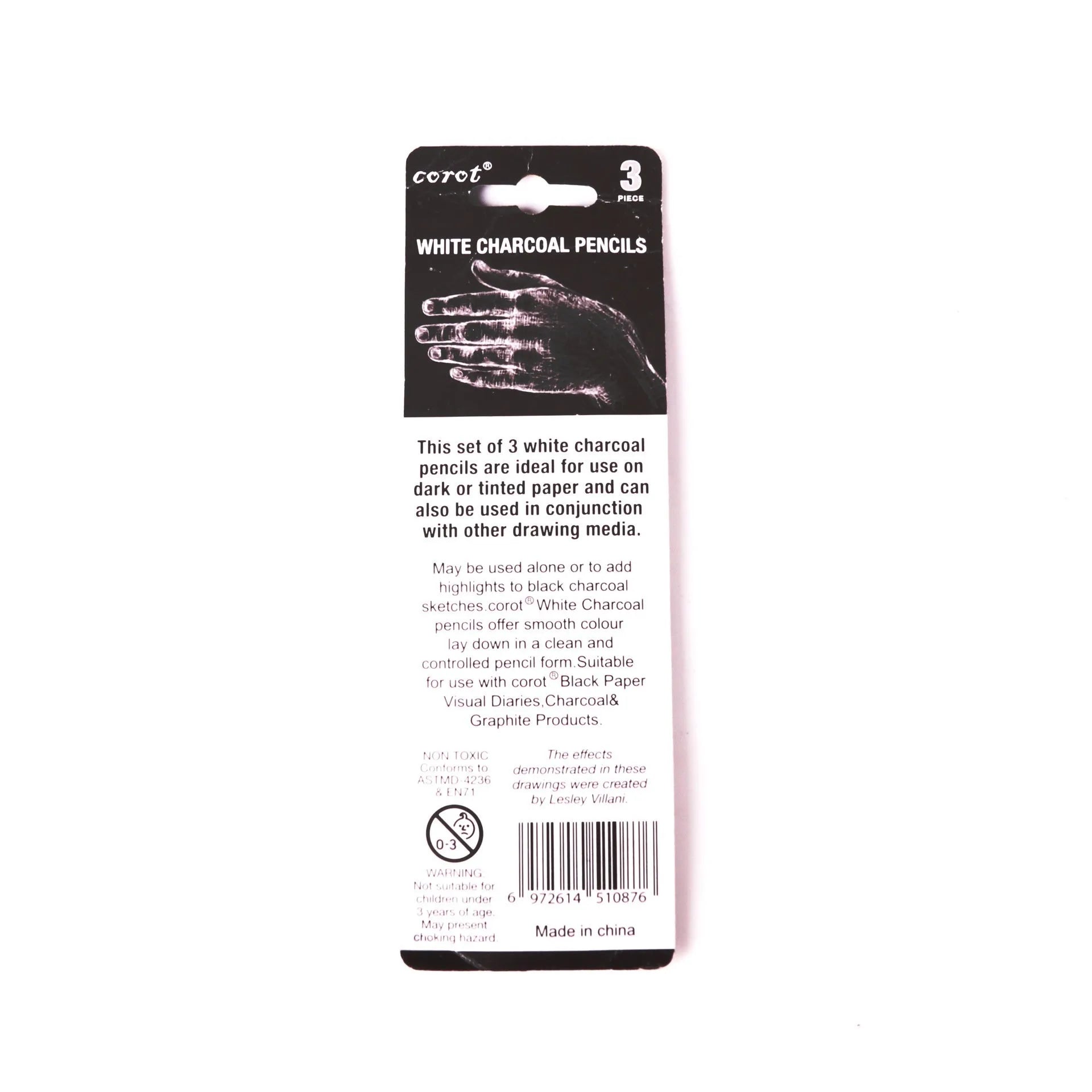 Set of three white charcoal sketching pencils with wooden barrels for highlighting on dark paper