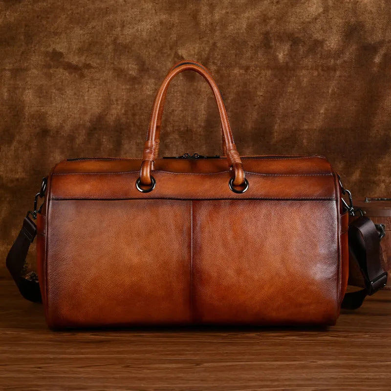 Handmade retro leather bag in vintage brown with first layer cowhide construction and below 20L capacity