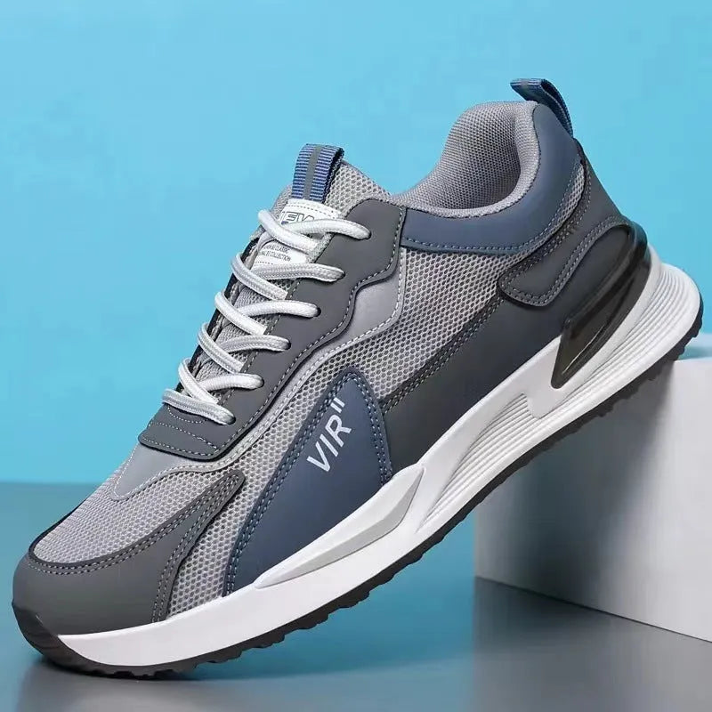 Men's colour block mesh sneakers in grey with lace-up closure and low-top design.