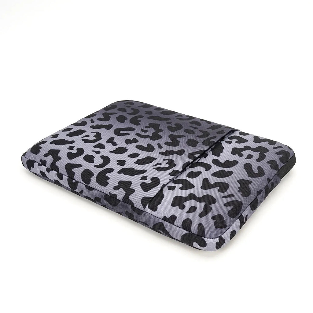 Leopard print laptop sleeve for 13-inch to 16-inch devices with flannel lining.