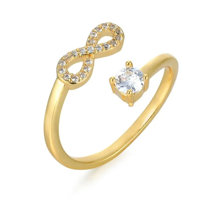 Open band geometric ring with zircon stones showing letter personalisation options A through Z