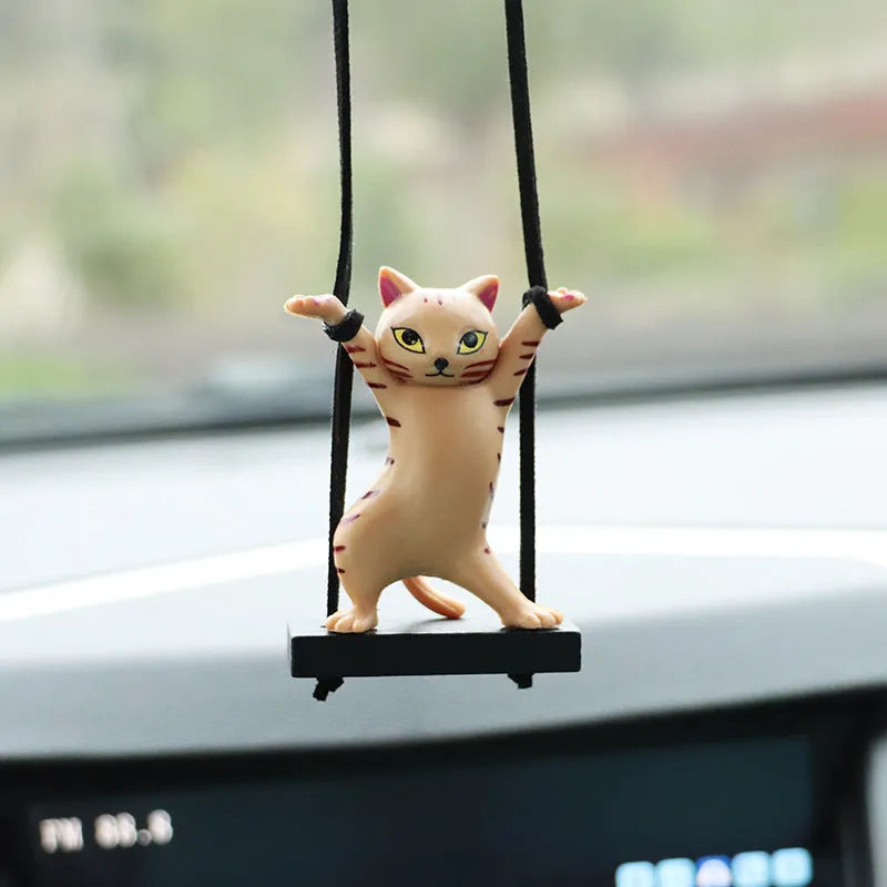Cartoon-style resin cat pendant car ornament with adjustable rope in colour options including black, white, floral, grey, and brown.