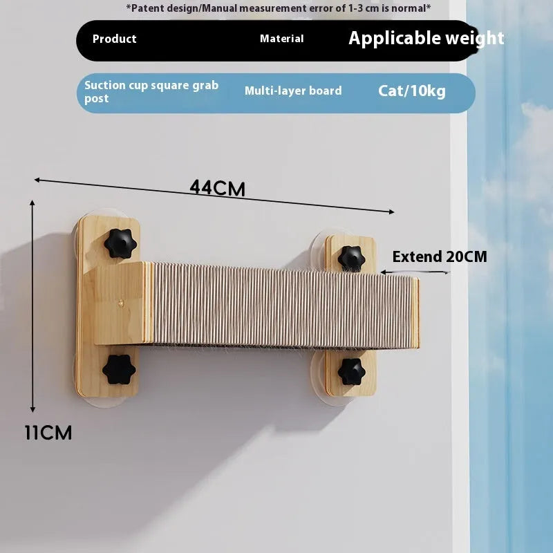 Space capsule shaped cat scratching post with sisal rope, mounted on a wall with a suction cup.