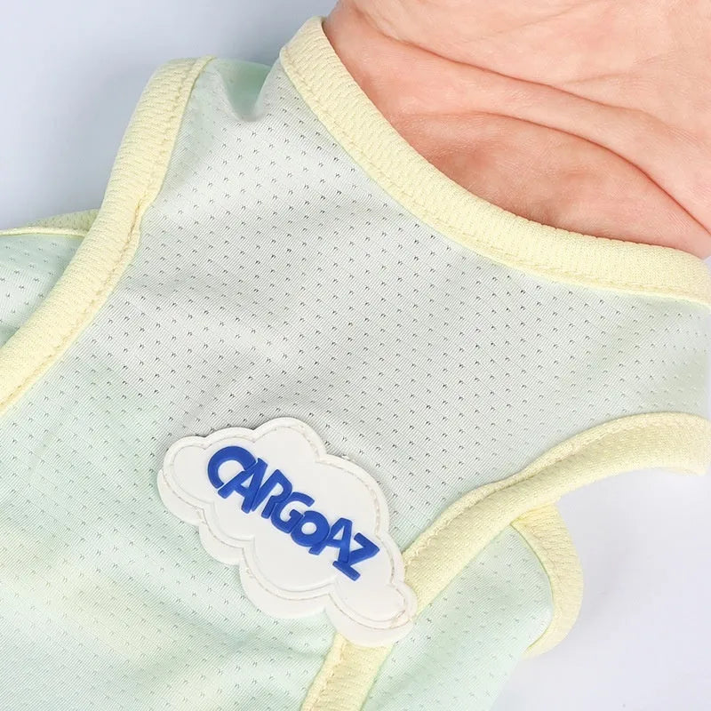 Cat wearing lightweight green mesh cooling vest with sports-style design