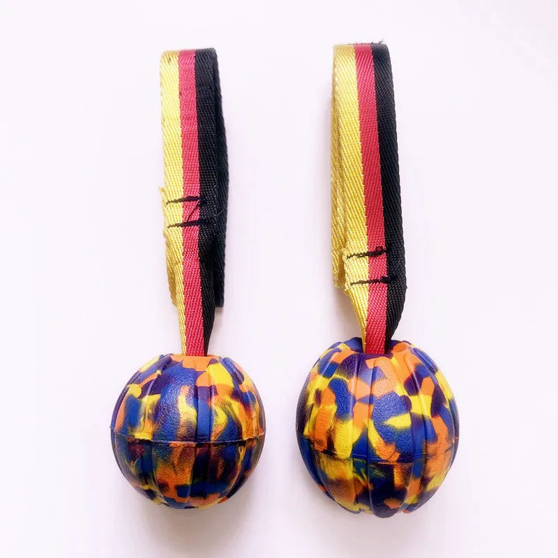 Floating bite-resistant EVA foam dog water ball toy in camouflage colour with string handle