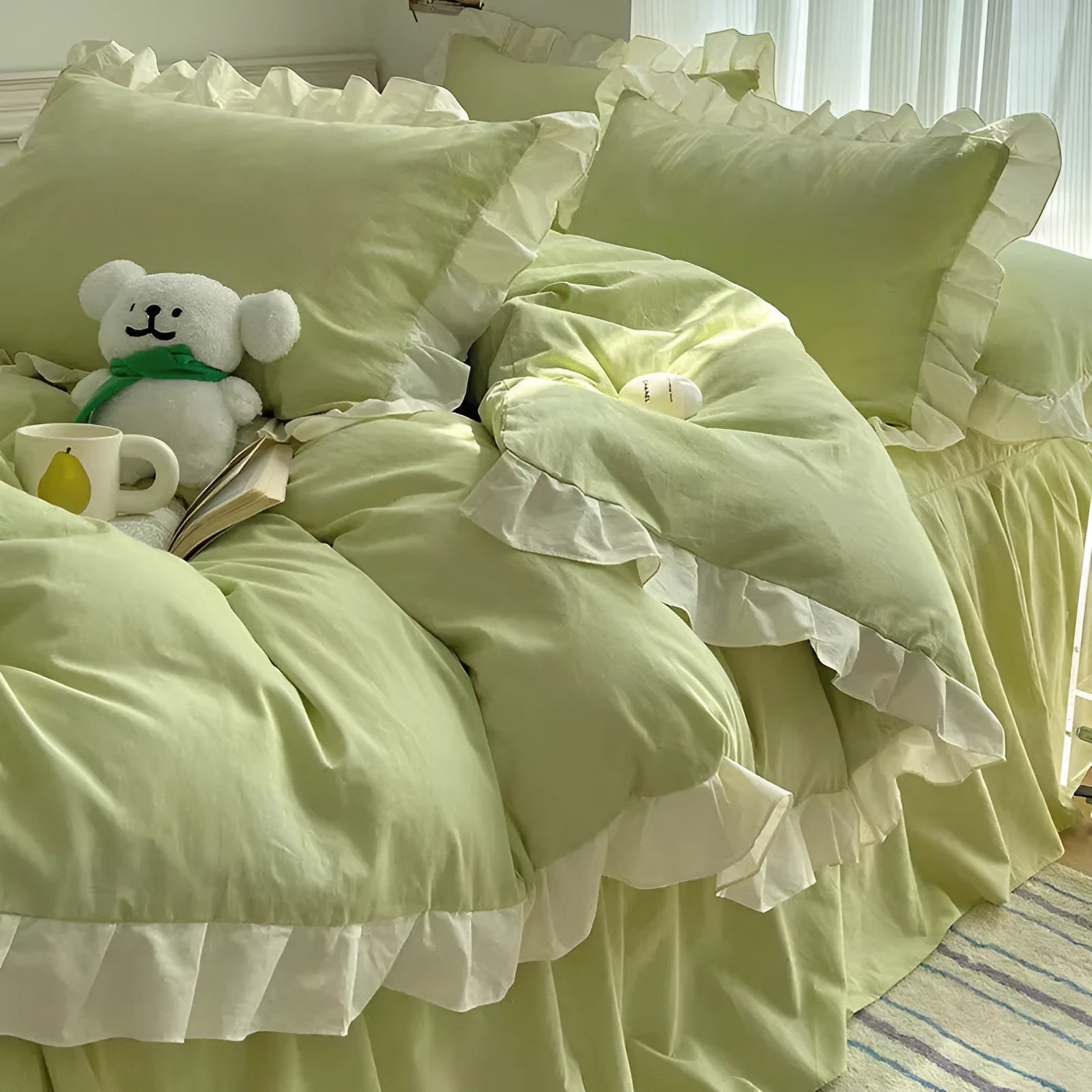 Mori style solid colour linen four-piece bedding set with quilt cover, sheet, and pillowcases on a bed.