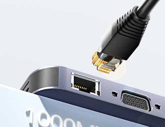 Black 11-in-1 USB-C laptop expansion dock with multiple ports and a 20cm white cable separator.