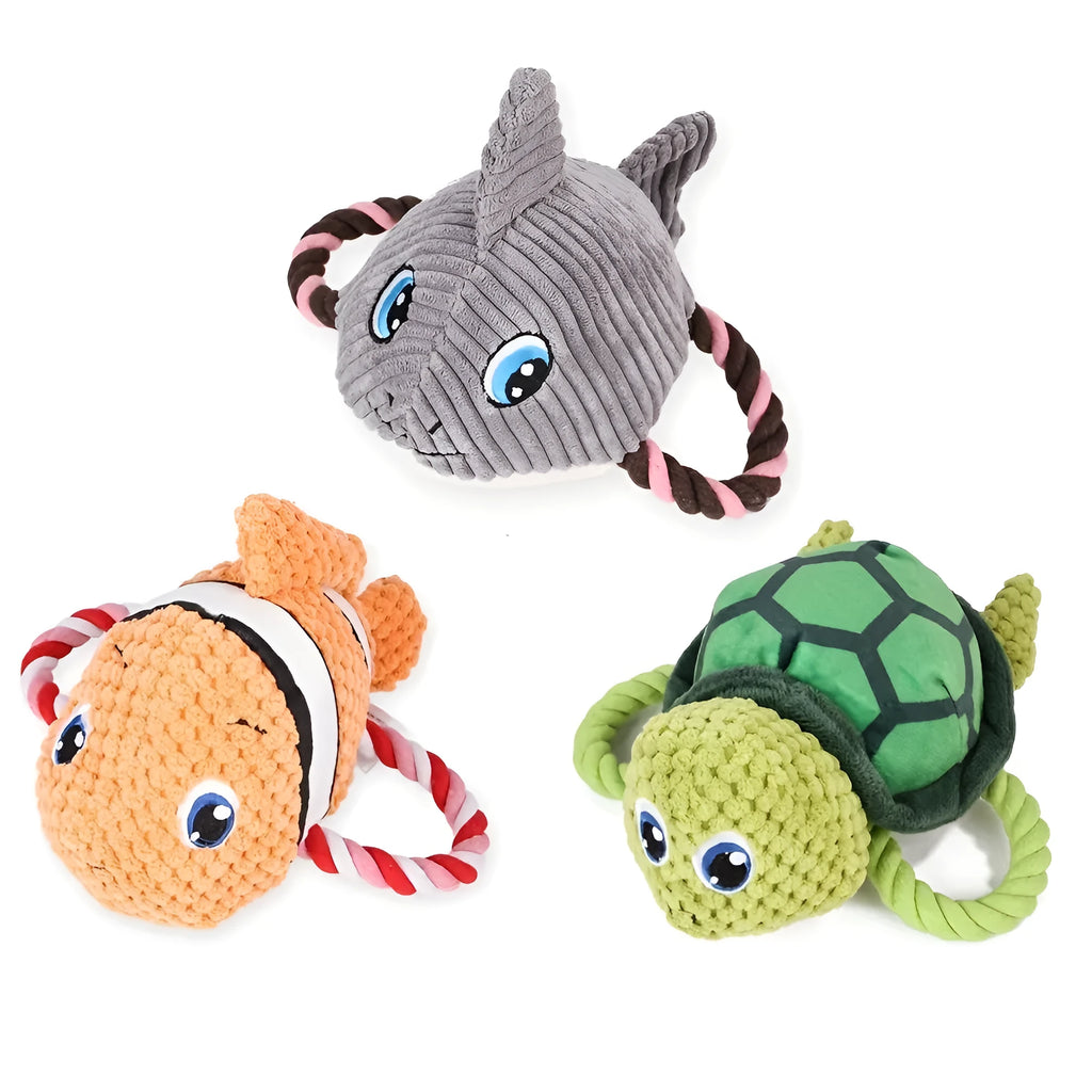 Turtle-shaped plush dog chew toy with knotted texture and squeaker inside
