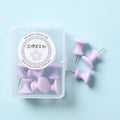 Box of colourful plastic push pins in cherry blossom pink, mint green and lavender macaron colours