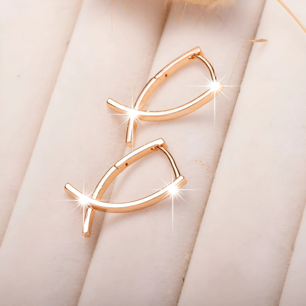 Rose gold cross shaped earrings on copper base with light luxury finish