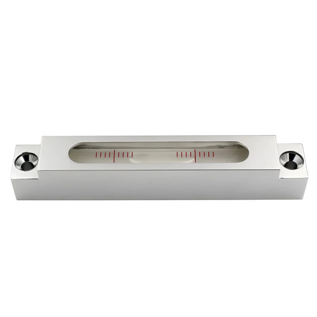 Small metal-bodied spirit level with glass vials, measuring 132mm in length.