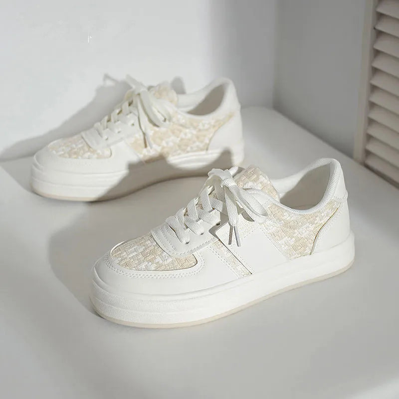 Beige platform sports board shoes with plaid pattern, rubber soles and lace-up front closure