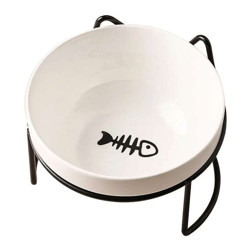 White ceramic cat bowl with decorative iron frame in cat footprints pattern