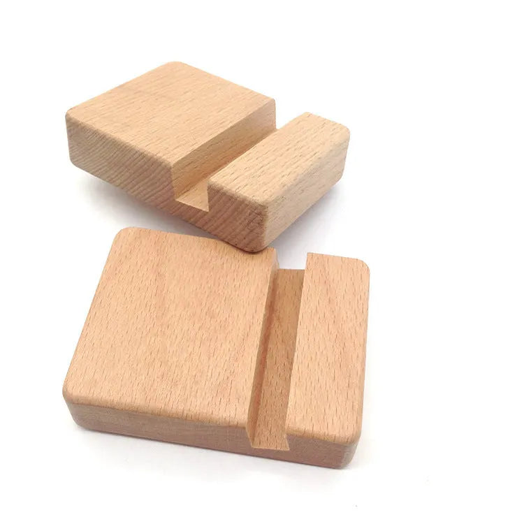Solid beech wood mobile phone stand with a decorative resin animal ornament and a coin slot.