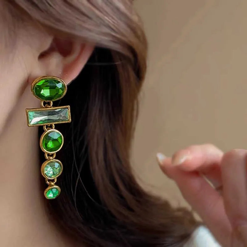 Retro green geometric earrings with dangling tassels and zircon detailing on alloy studs