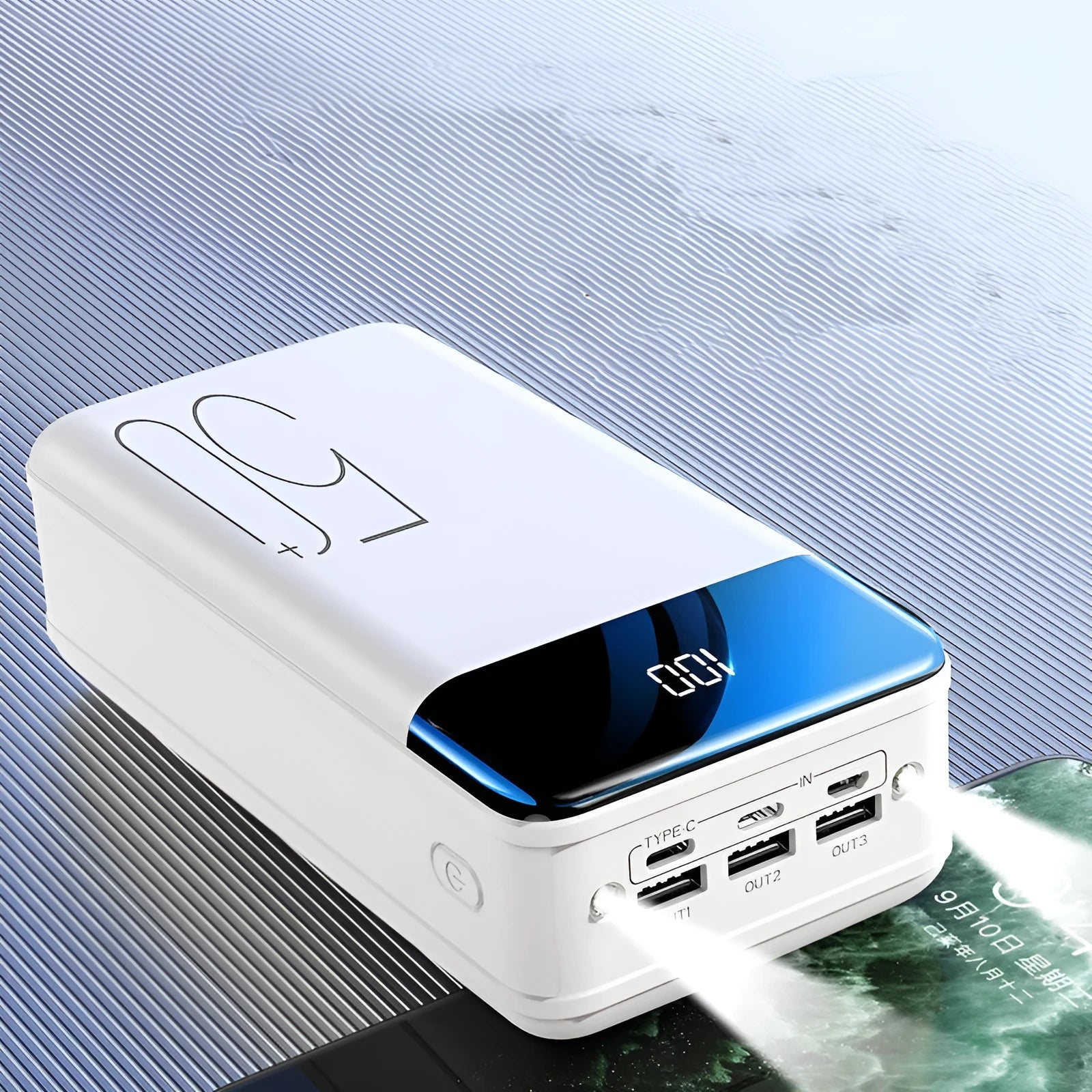 Large black or white 50000mAh power bank with multiple USB ports showing dimensions 169x83x52mm