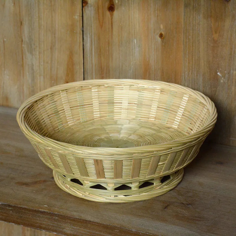 Handmade natural bamboo storage basket in three different sizes for household organisation