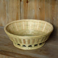 Handmade natural bamboo storage basket in three different sizes for household organisation