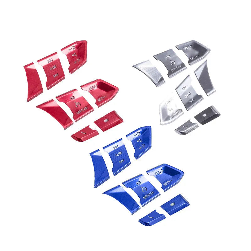 Atz aluminium alloy decorative stickers for car steering wheel buttons and interior trim, showing brushed metal and carbon fibre finishes.
