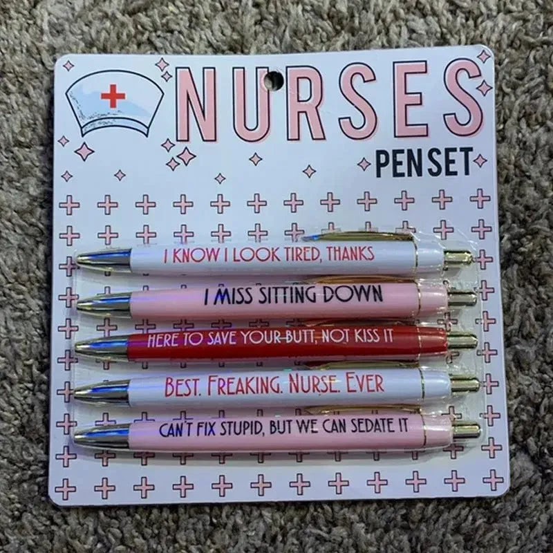 Set of five white nurse theme ballpoint pens with retractable tips.