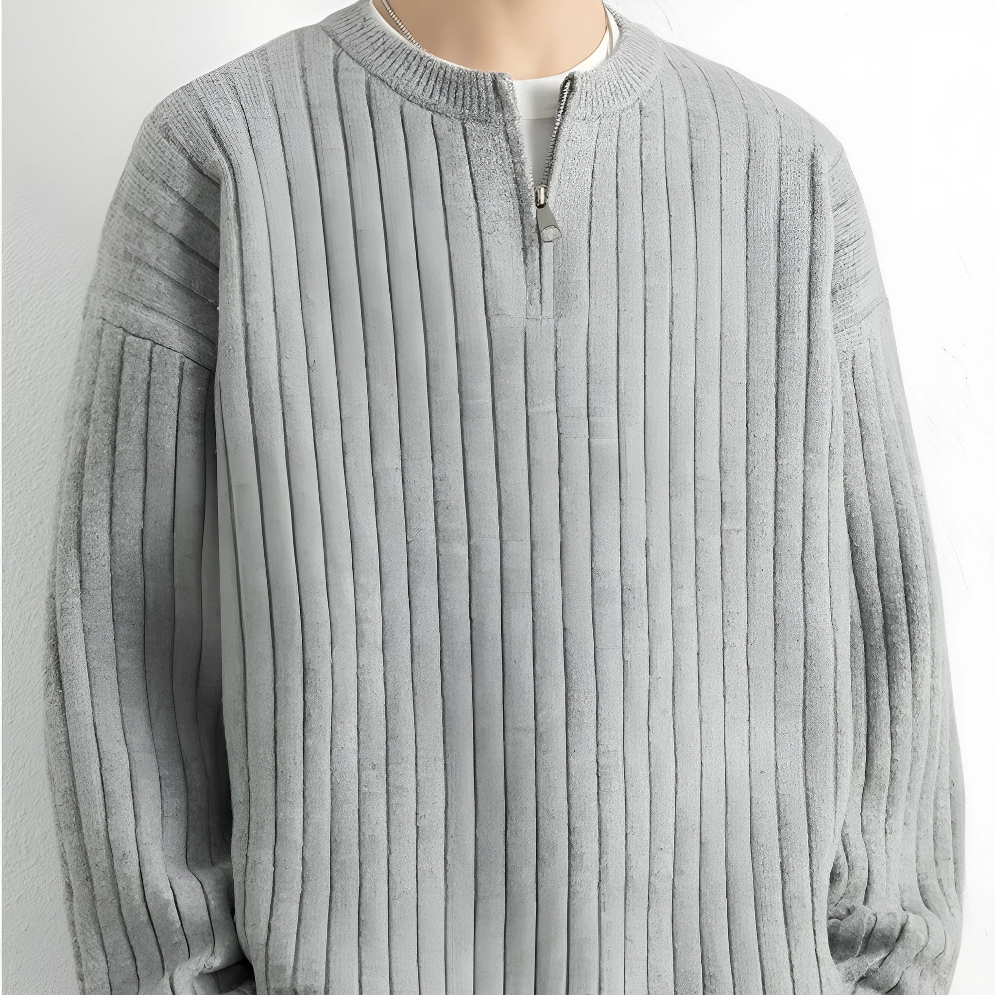 Men's grey half zip sweater with loose fit and textured knitted design