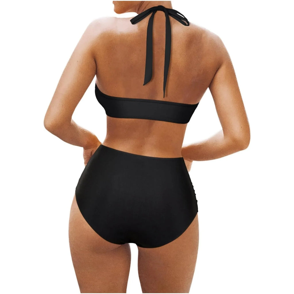 Women's black polyester bikini swimsuit top and briefs laid flat