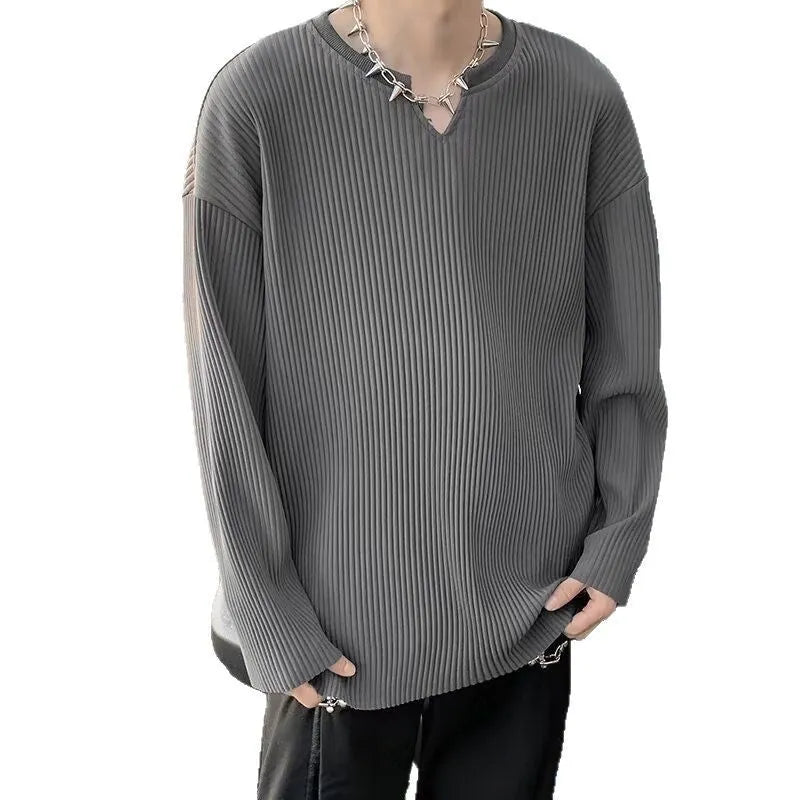 Plus size loose pullover top with striped texture and long sleeves in black colour