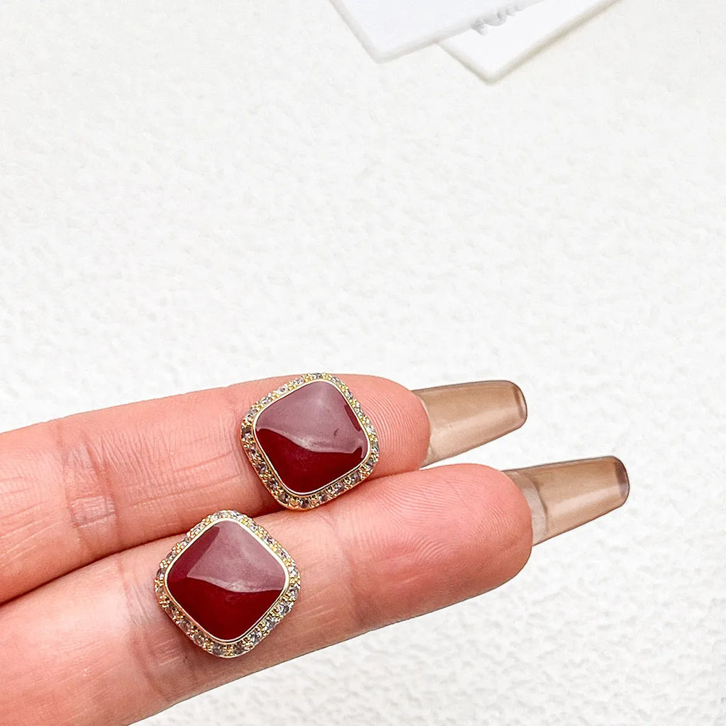 Red square geometric alloy earrings with retro design and stud backing