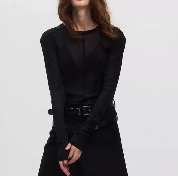 Women's black slim-fit mesh see-through long sleeve PU pullover on a hanger.