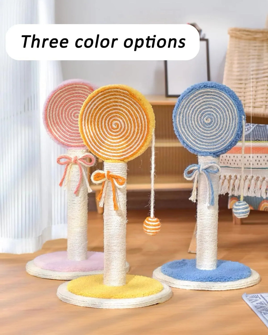 Blue cat scratching post with sisal rope and a hanging yellow ball on a sturdy wooden base.