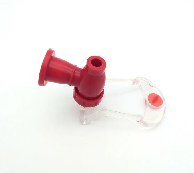 Red plastic Magic Tap soda bottle dispenser with push-button tap for 2-litre bottles.
