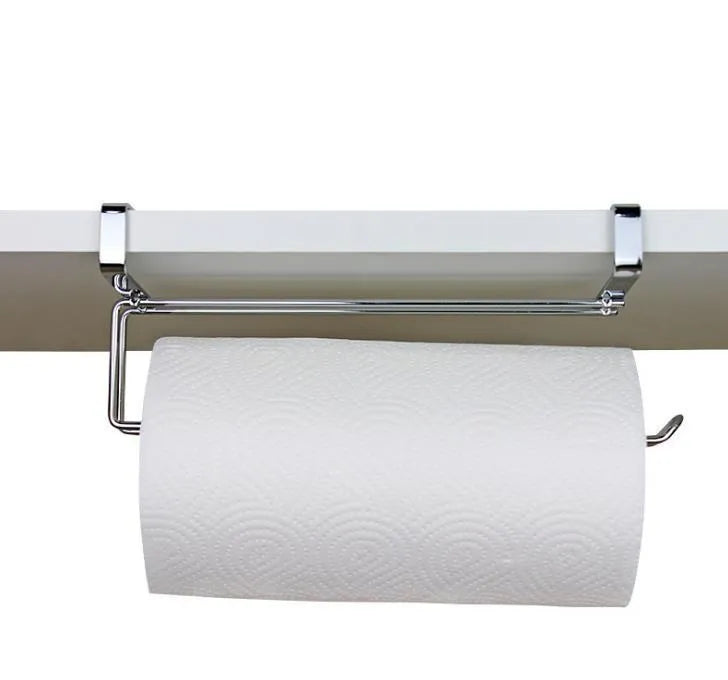 Silver stainless steel paper towel rack mounted on a cabinet door.