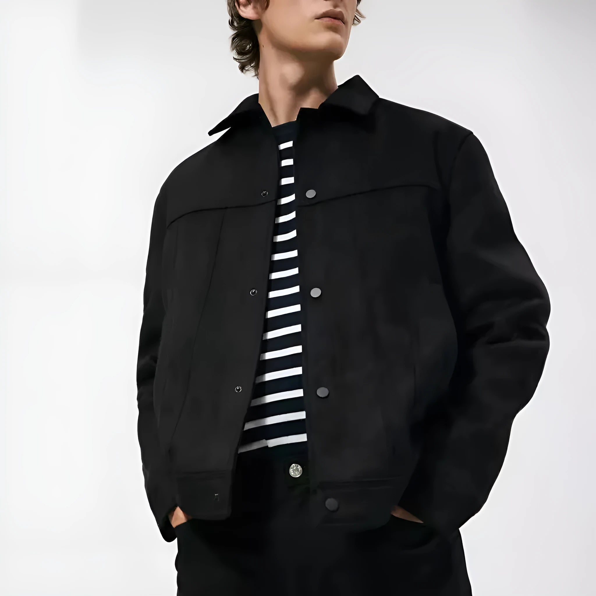 Black men's hooded jacket with a suede collar and side seam pockets on a hanger.