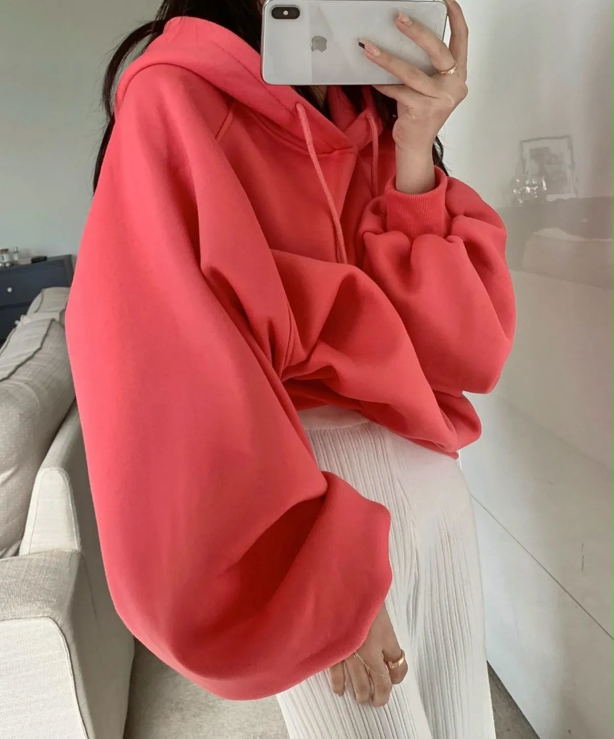 Watermelon red sleeveless Mulberry Silk hooded sweater on a hanger, showing loose fit and solid colour.