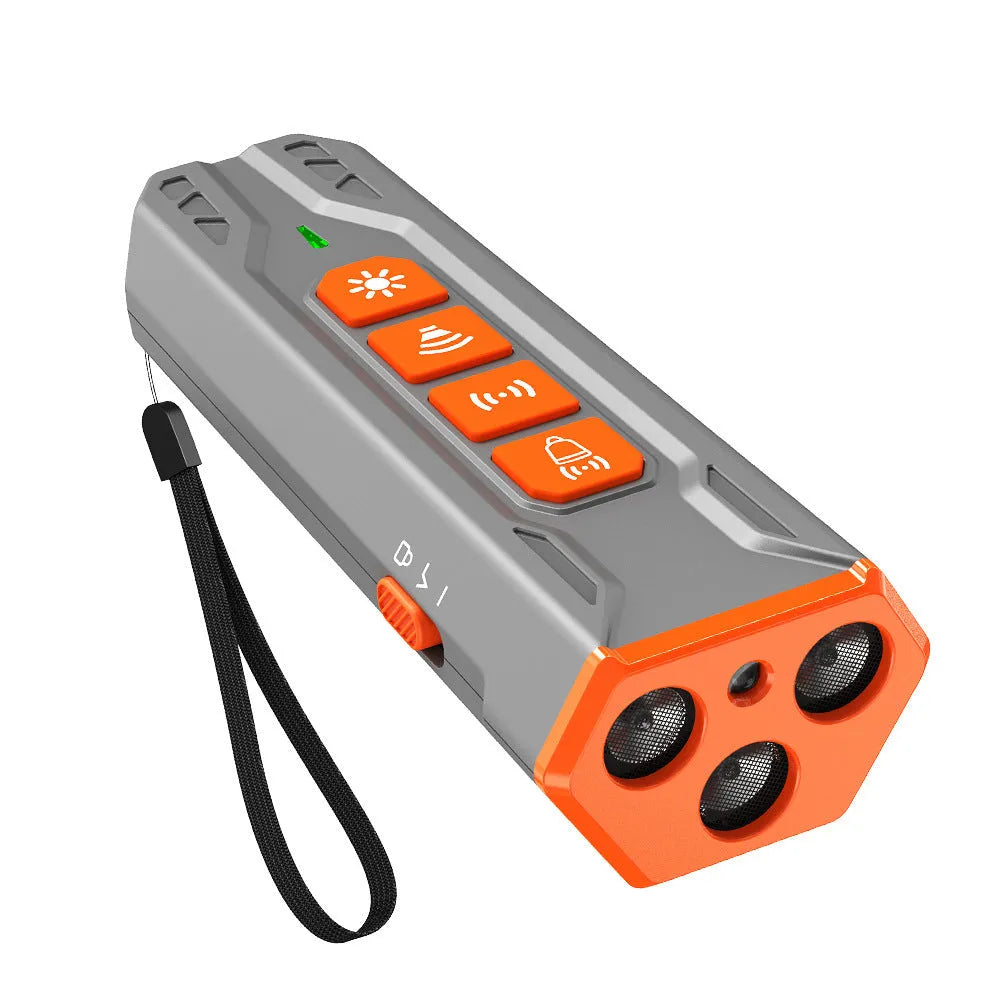Ultrasonic dog trainer with three adjustable heads in grey and orange colour scheme.