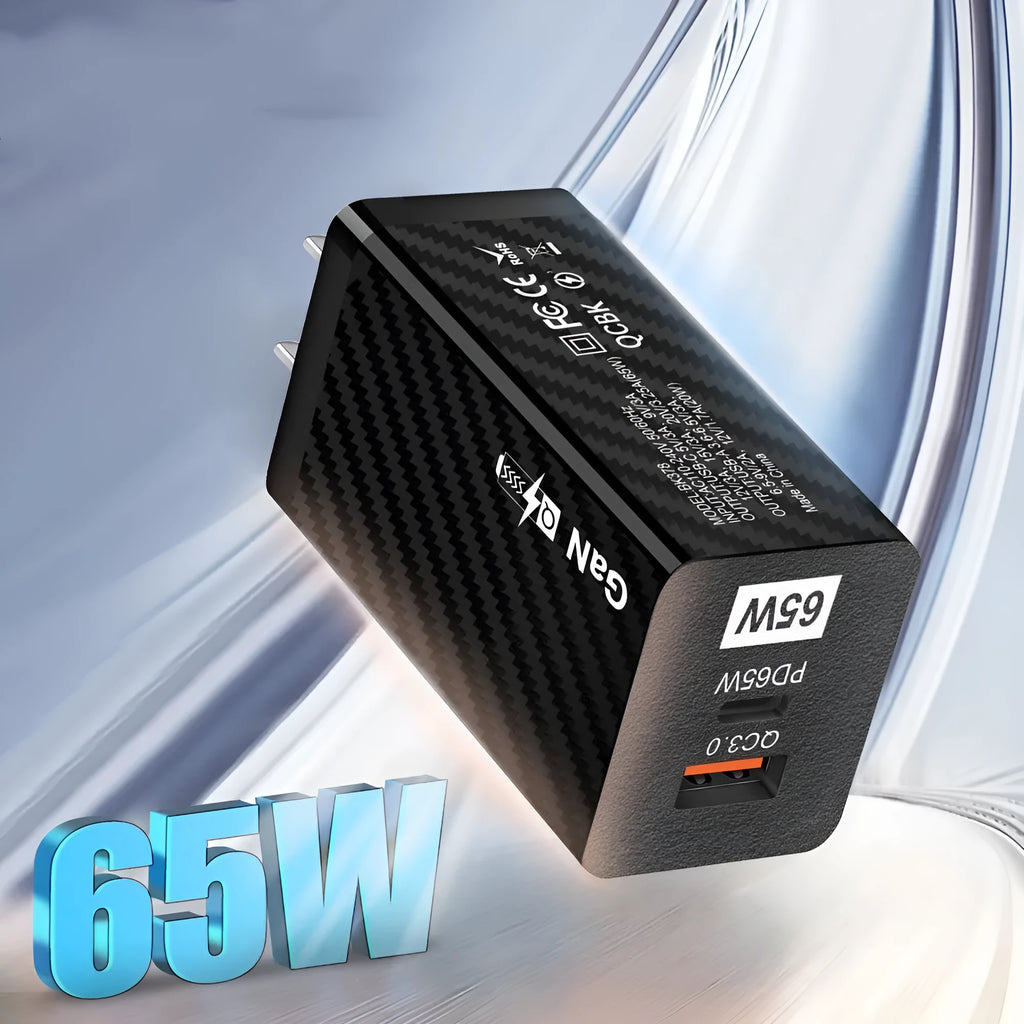 White GaN 65W universal laptop charger with USB PD port showing compact dimensions