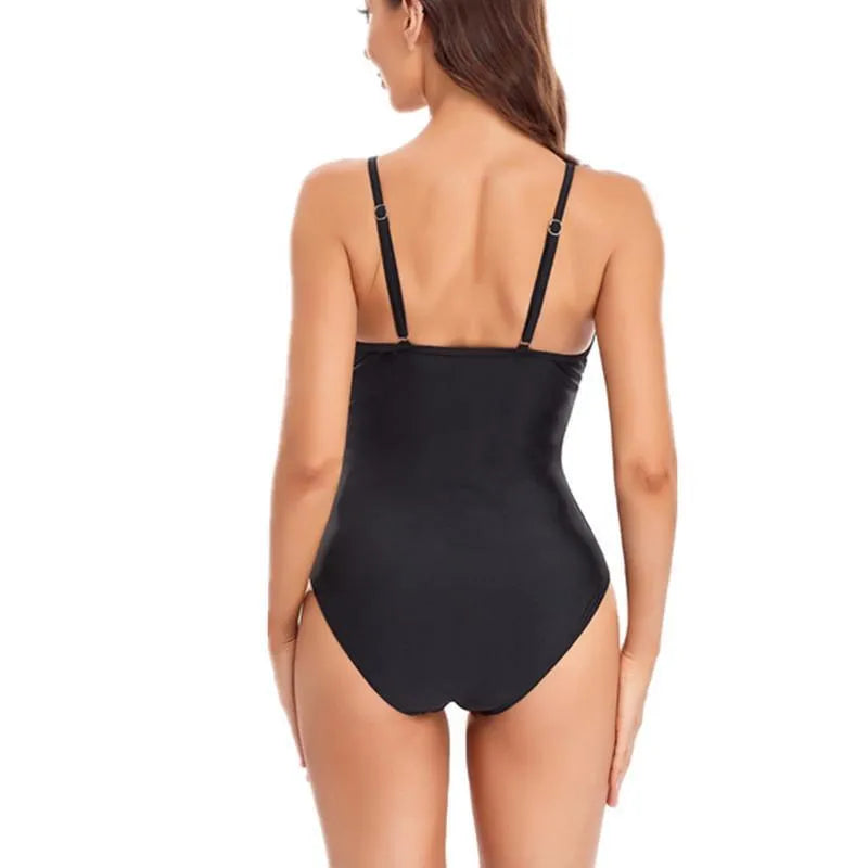 Ladies black or blue solid color one-piece swimsuit with mesh fabric and backless design