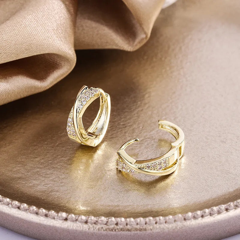 Geometric copper earrings with zircon treatment in 14K yellow colour